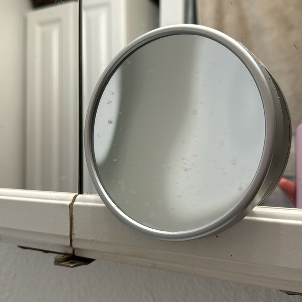 Small round  mirror.
